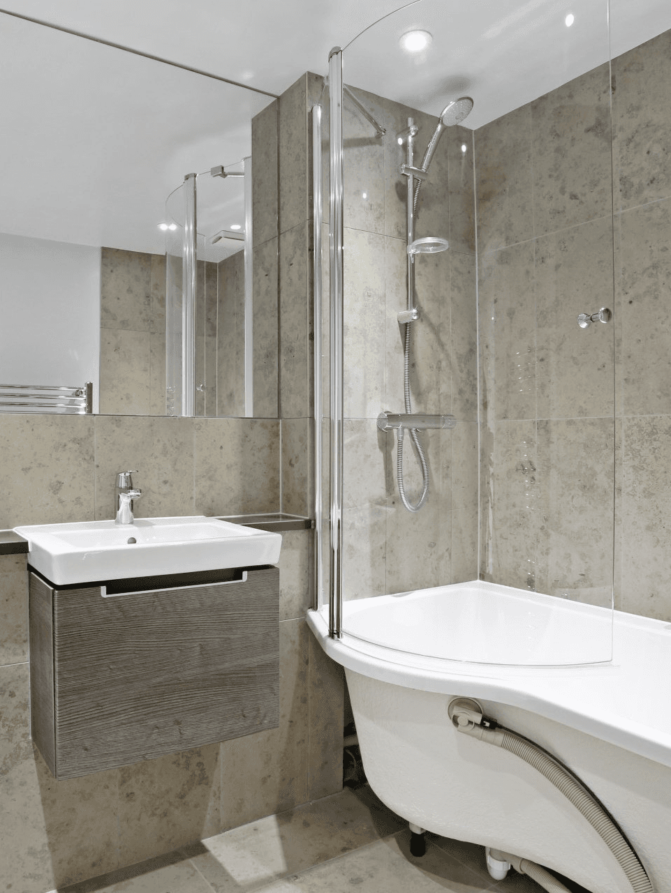 Bathroom with bath and shower